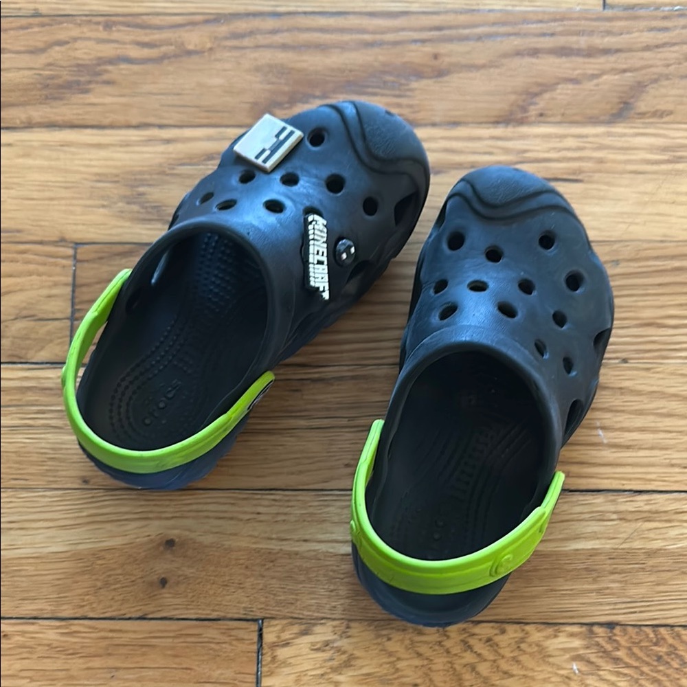 Kids Black and Green Crocs Clogs